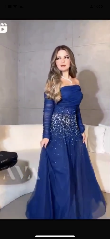 فستان اب مع تطريز فصوص