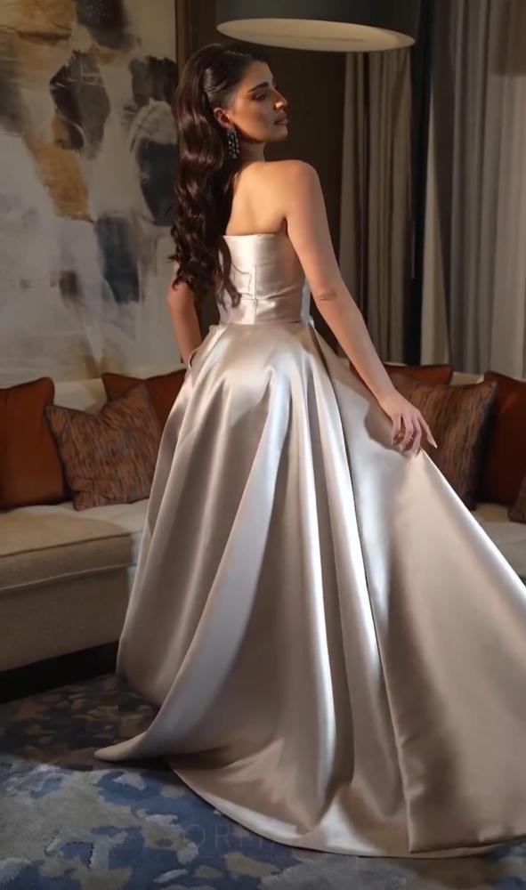 Elegant beige embroidered evening dress