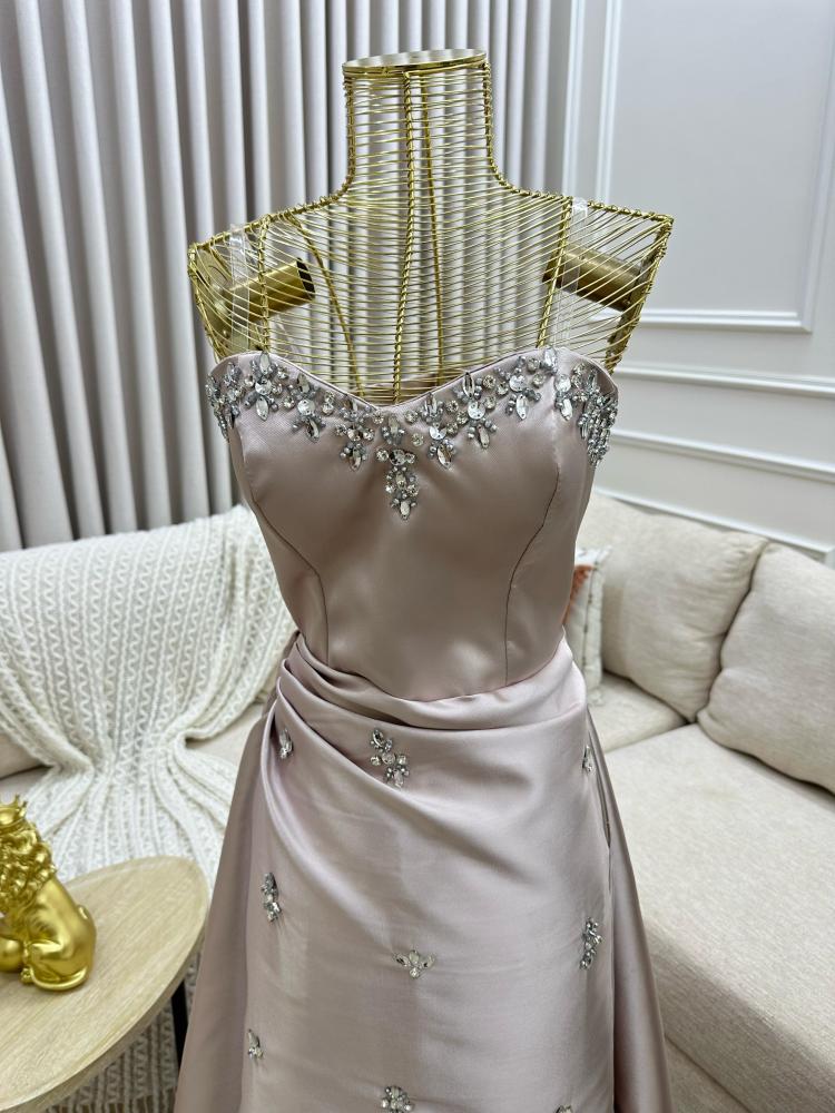 Elegant beige embroidered evening dress