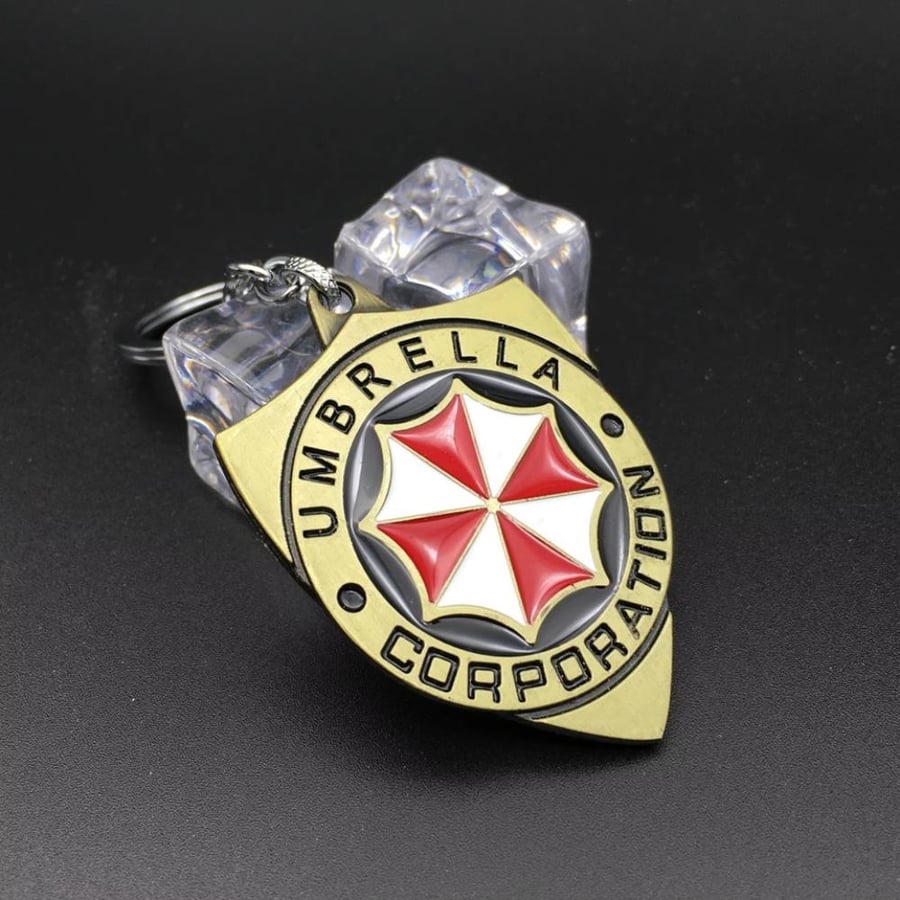 ميدالية شعار شركة أمبريلا (Resident Evil: Umbrella Corporation Metal Keychain) - إصدار سبائك الزنك شعار مؤسسة أمبريلا الأيقوني