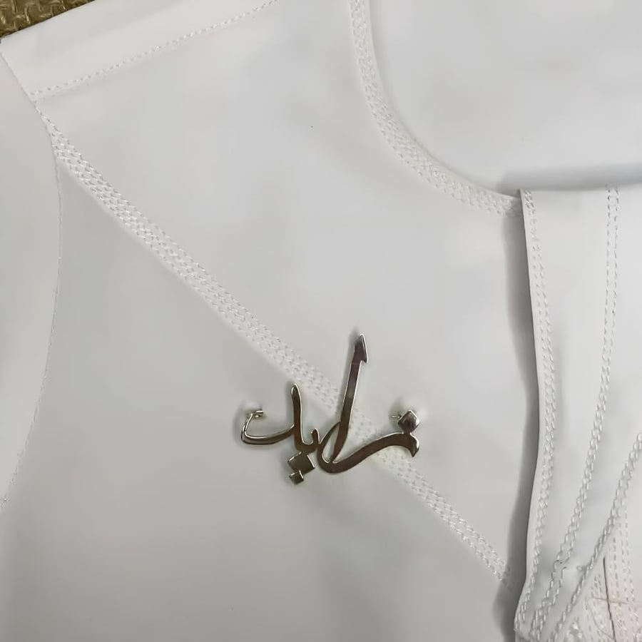 بروش رسمي انيق مطلي ذهب