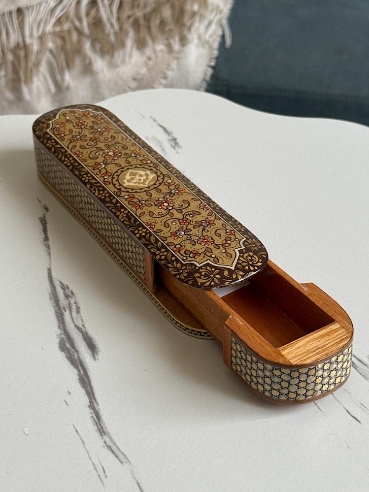 Long box with full carved pull