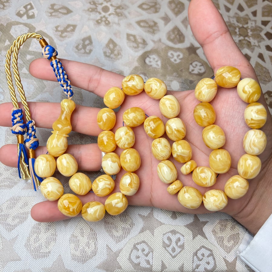 سبحة كهرمان كلنقرادي بيض حمام