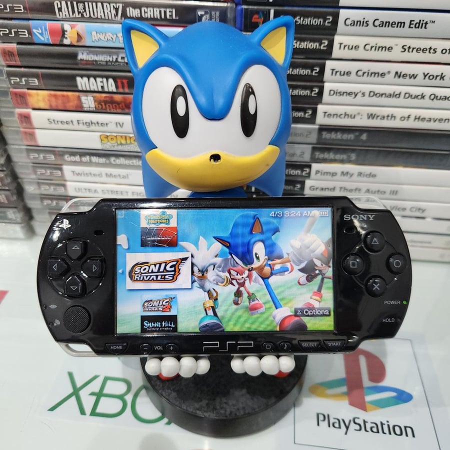 PSP جهاز بي اس بي مبرمج بداخله ١٤٠٠ لعبة ( سليم موديل ٢٠٠٠ )