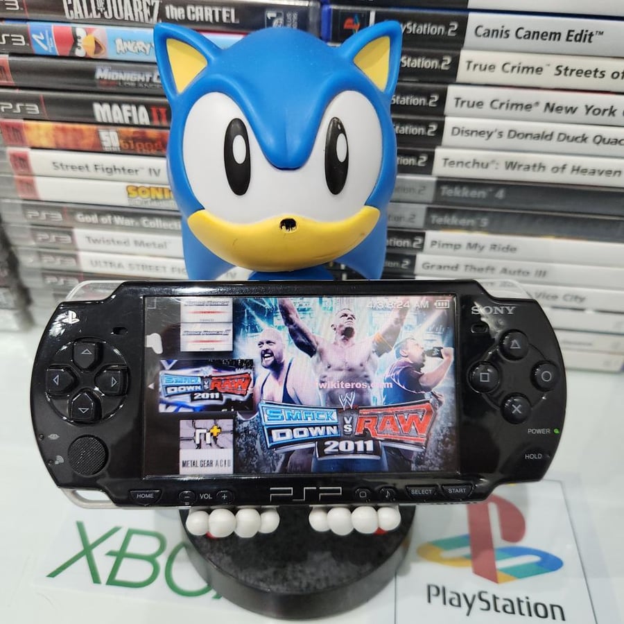 PSP جهاز بي اس بي مبرمج بداخله ١٤٠٠ لعبة ( سليم موديل ٢٠٠٠ )