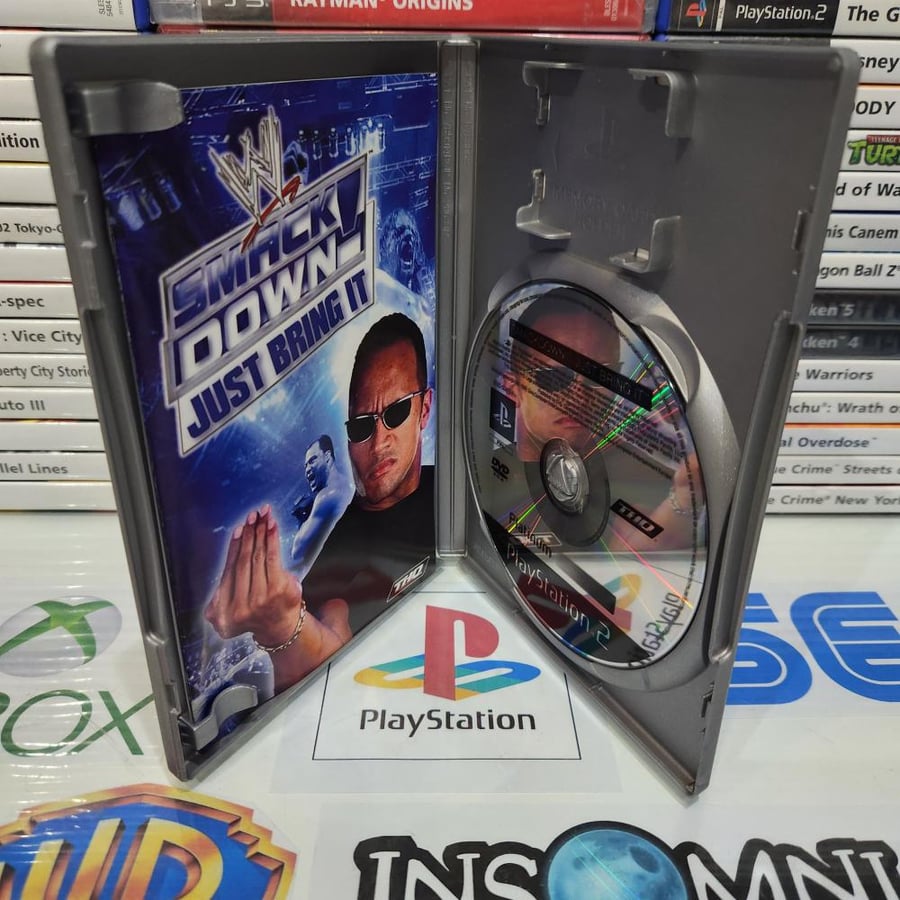 PS2 smack down vs raw just bring it