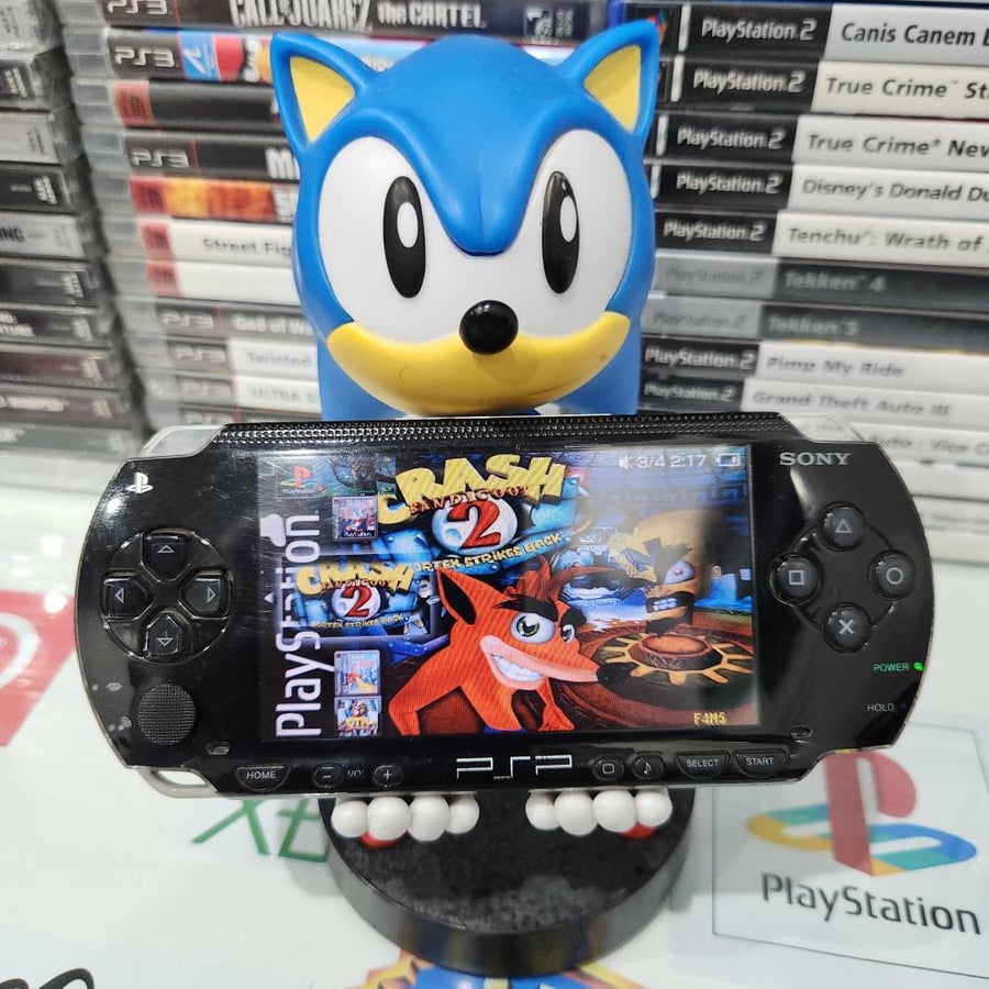 PSP جهاز بي اس بي مبرمج بداخله ١٤٠٠ لعبة ( فات موديل 1000 )