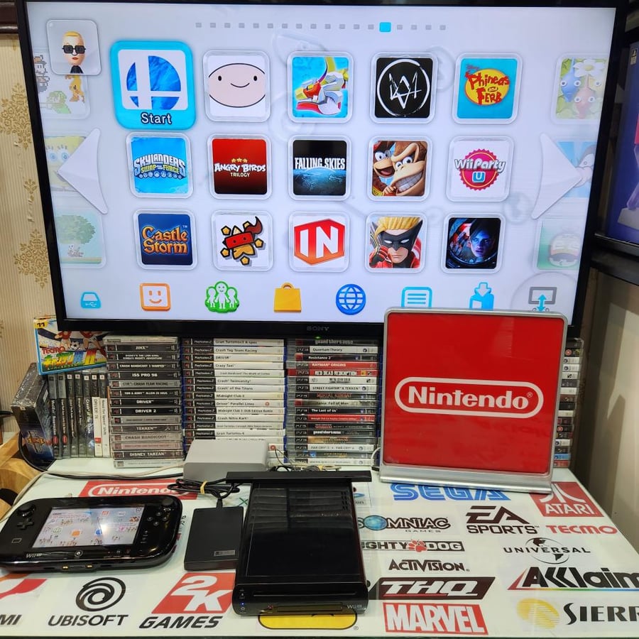 WIIU جهاز نينتدو وي يو مبرمج بداخله اكثر من ٢٠٠ لعبة