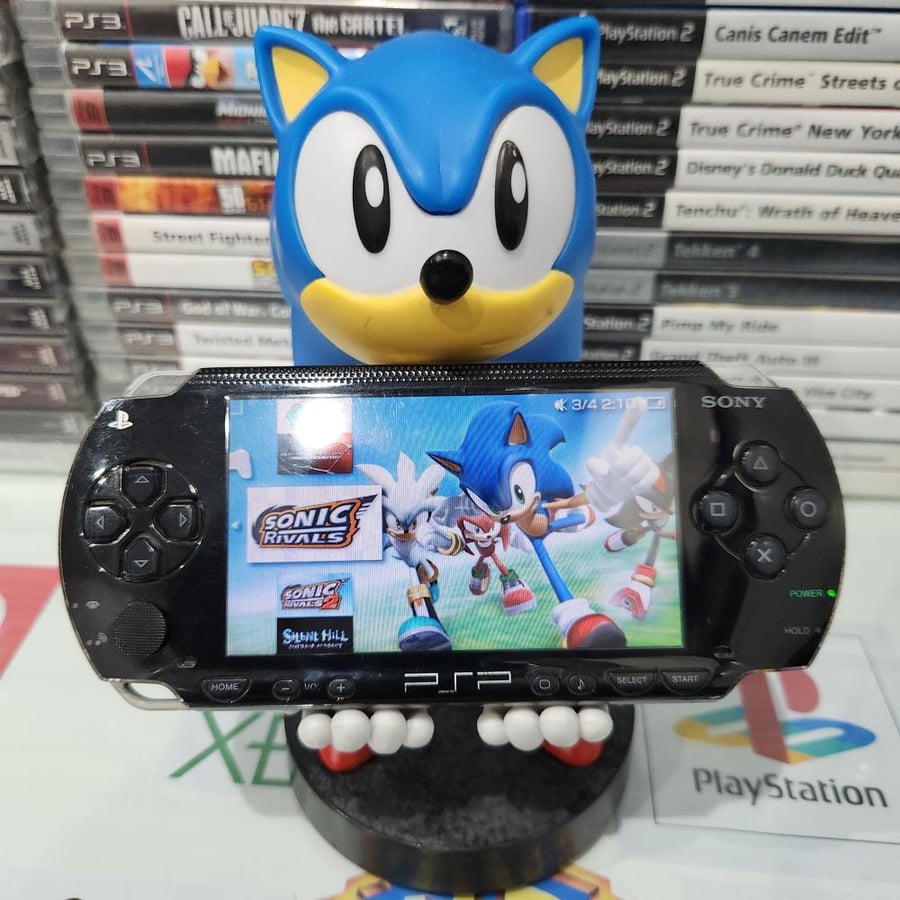 PSP جهاز بي اس بي مبرمج بداخله ١٤٠٠ لعبة ( فات موديل 1000 )