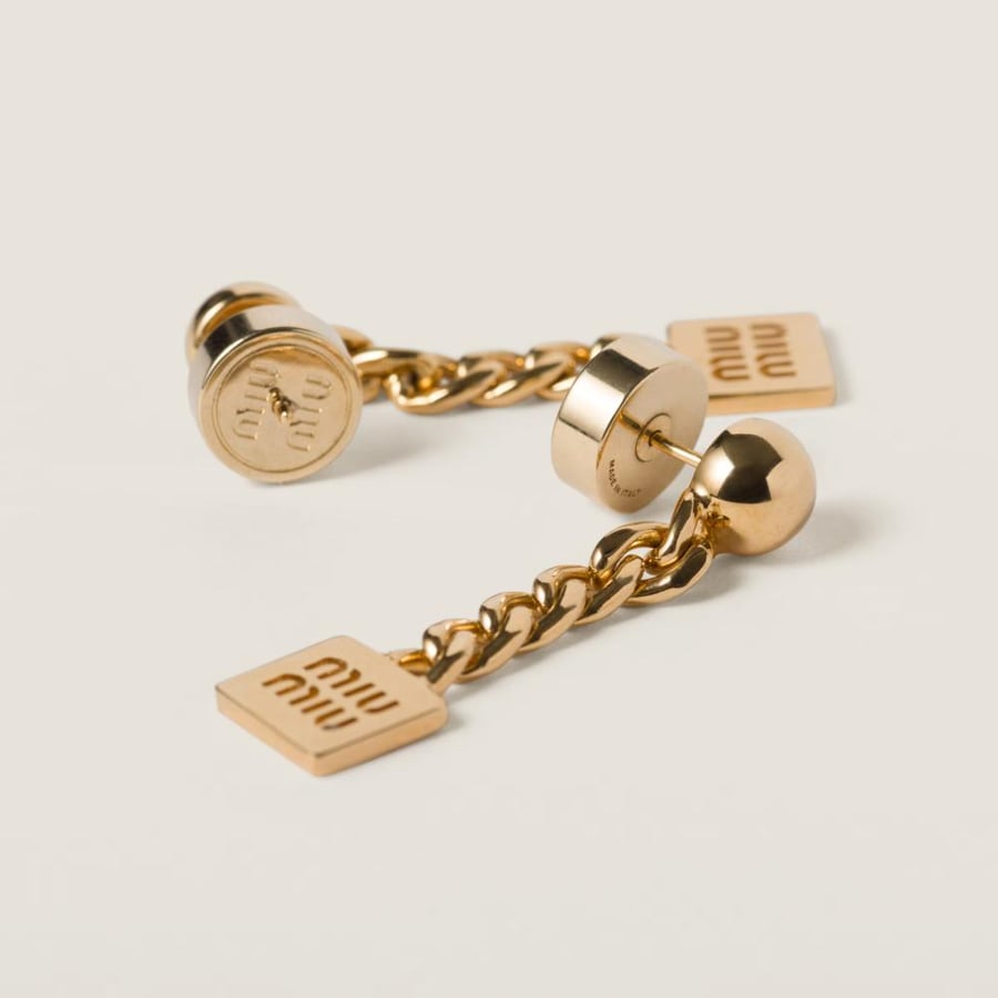 أقراط miumiu معدنية