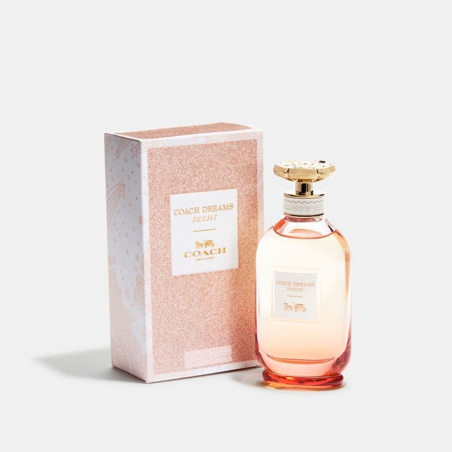 عطر ميني نسائي دريم صن سيت 7.5 ML بخاخ مع محفظة انبقة