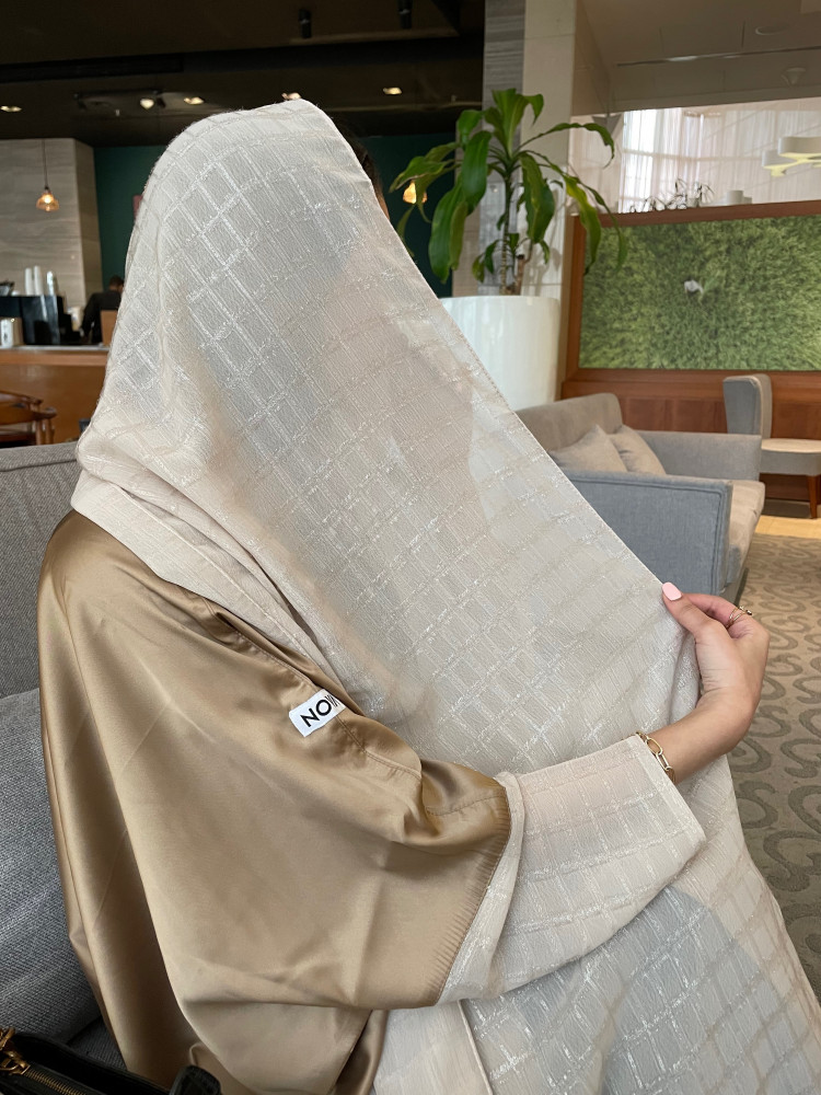 135 "الطرحة"
