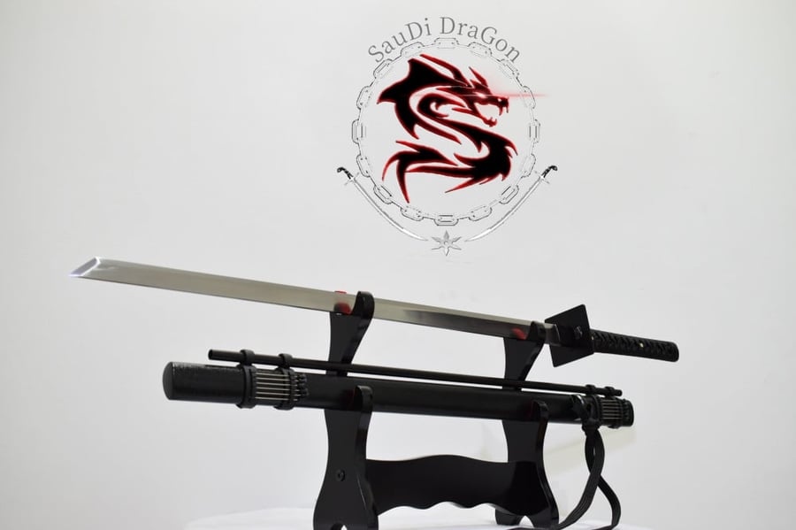 Ninja sword with needle launcher