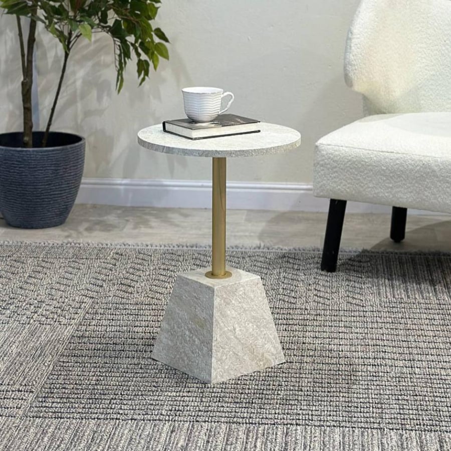Round service table with marble alternative