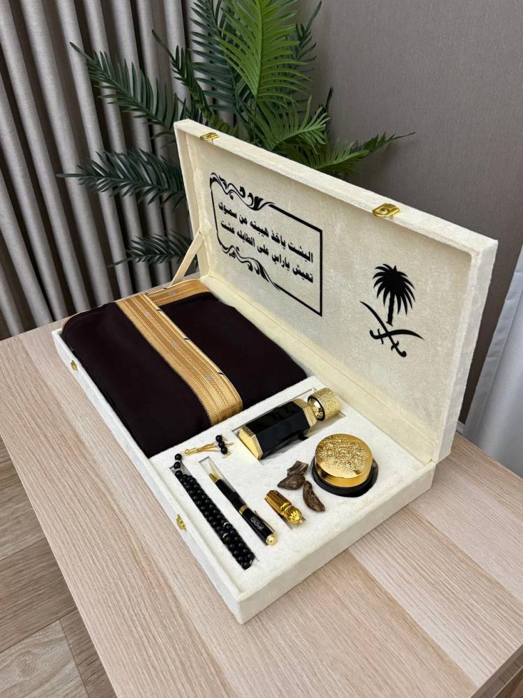 Royal gift box with a fur coat and a leather notebook designed upon request