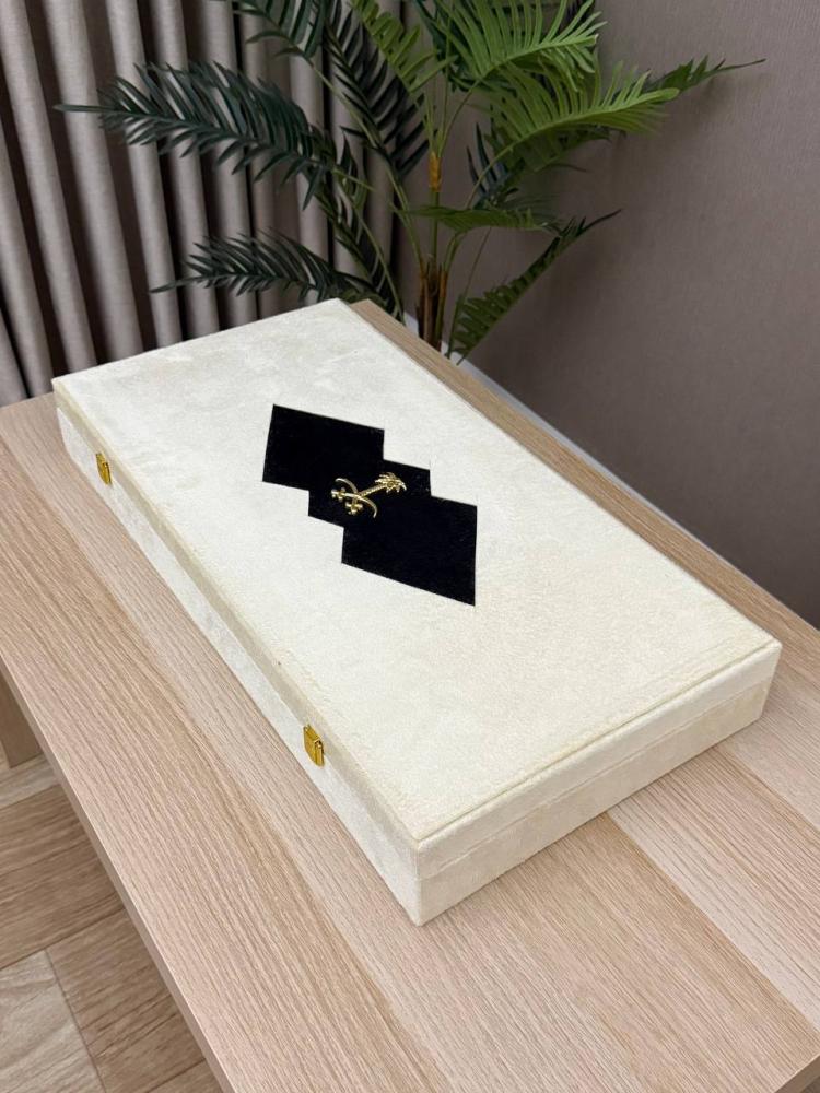 Royal gift box with a fur coat and a leather notebook designed upon request