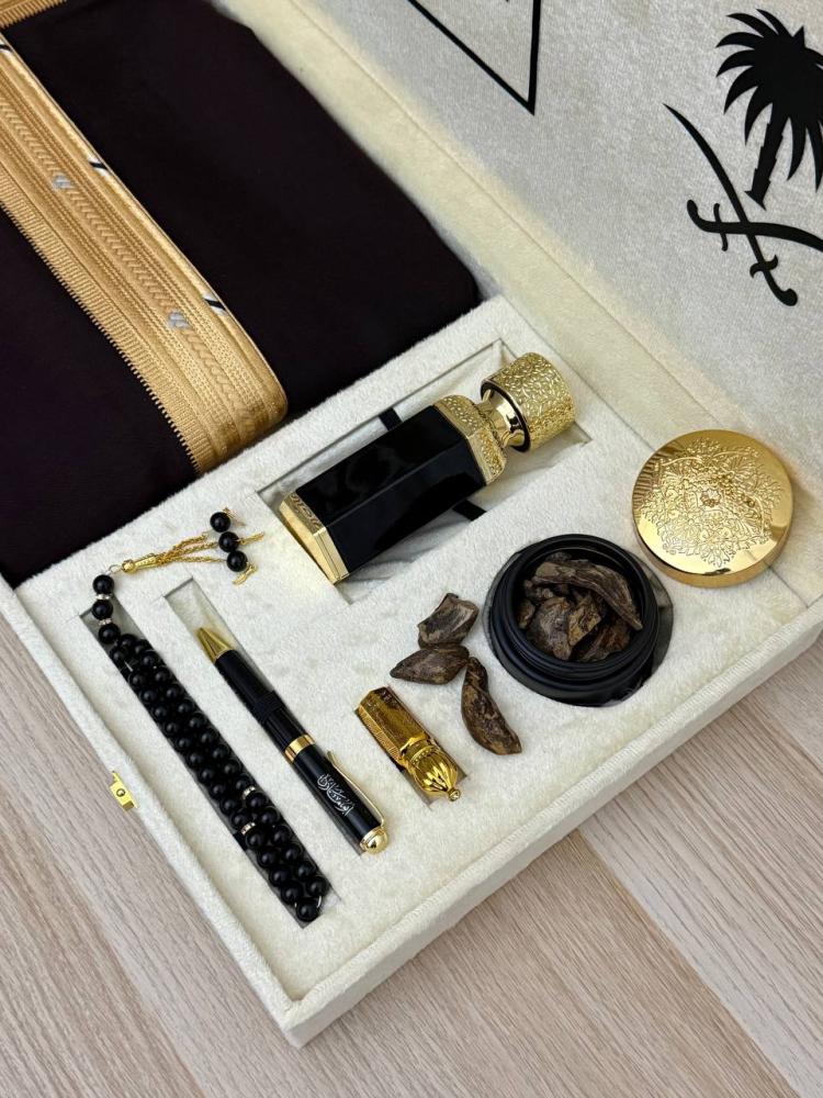 Royal gift box with a fur coat and a leather notebook designed upon request