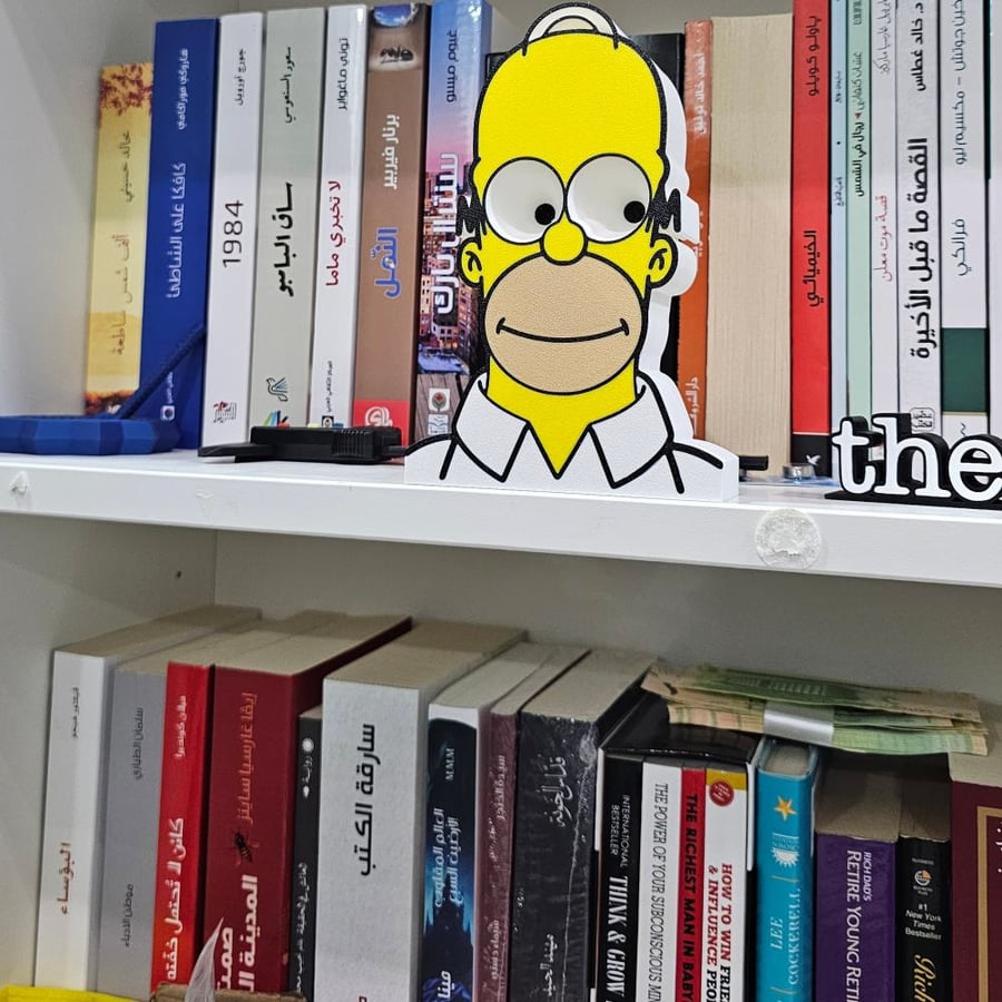 Homer Simpson is following you انت مراقب