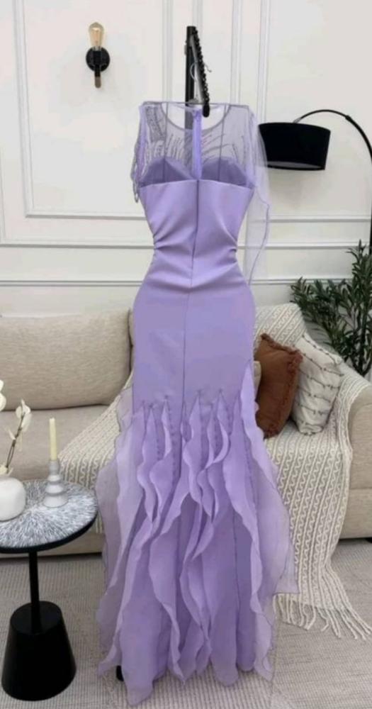 Evening dress with pendants