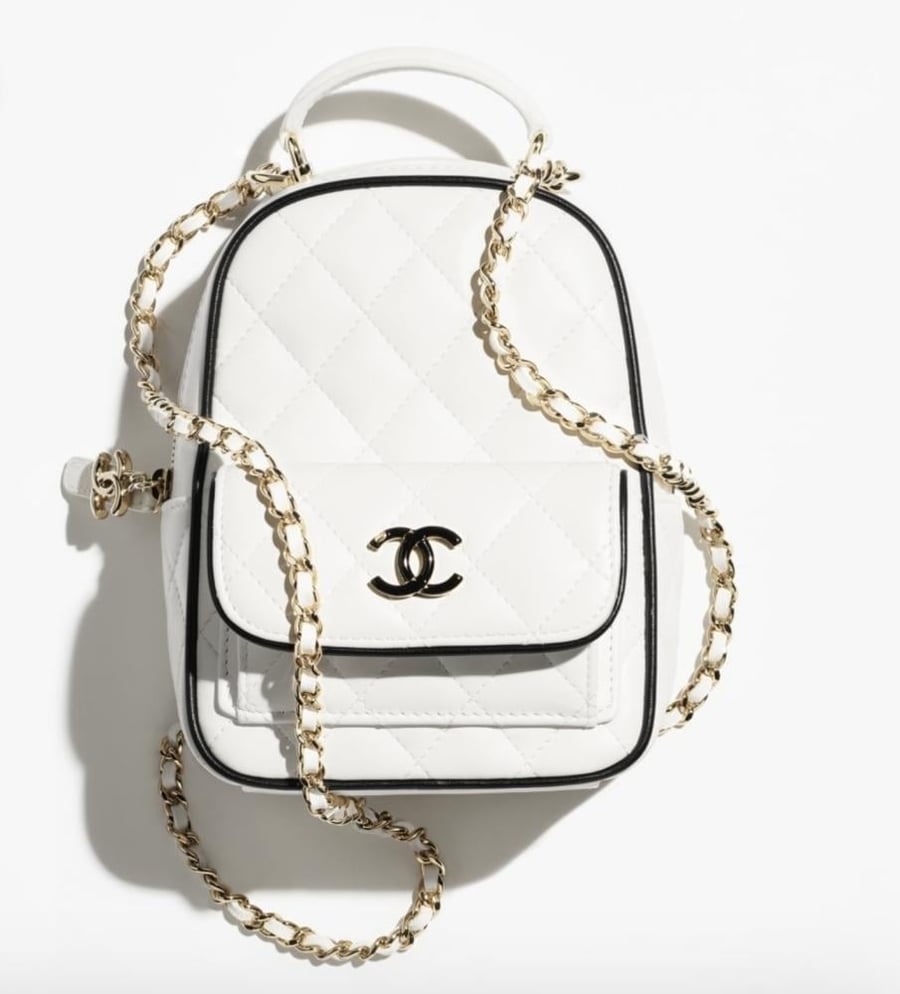 CHANEL white BACKPACK  حقيبة شانيل ظهر أبيض بإطار أسود