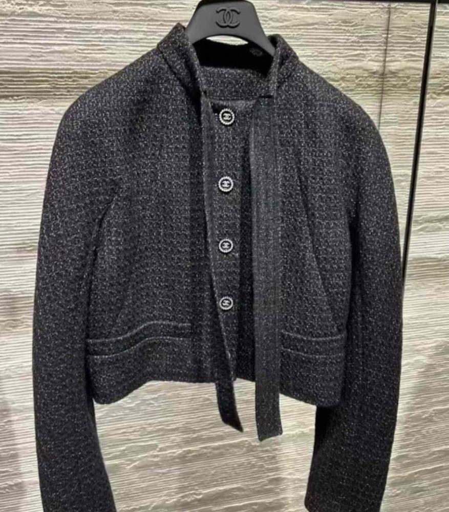 Black Chanel tweed jacket