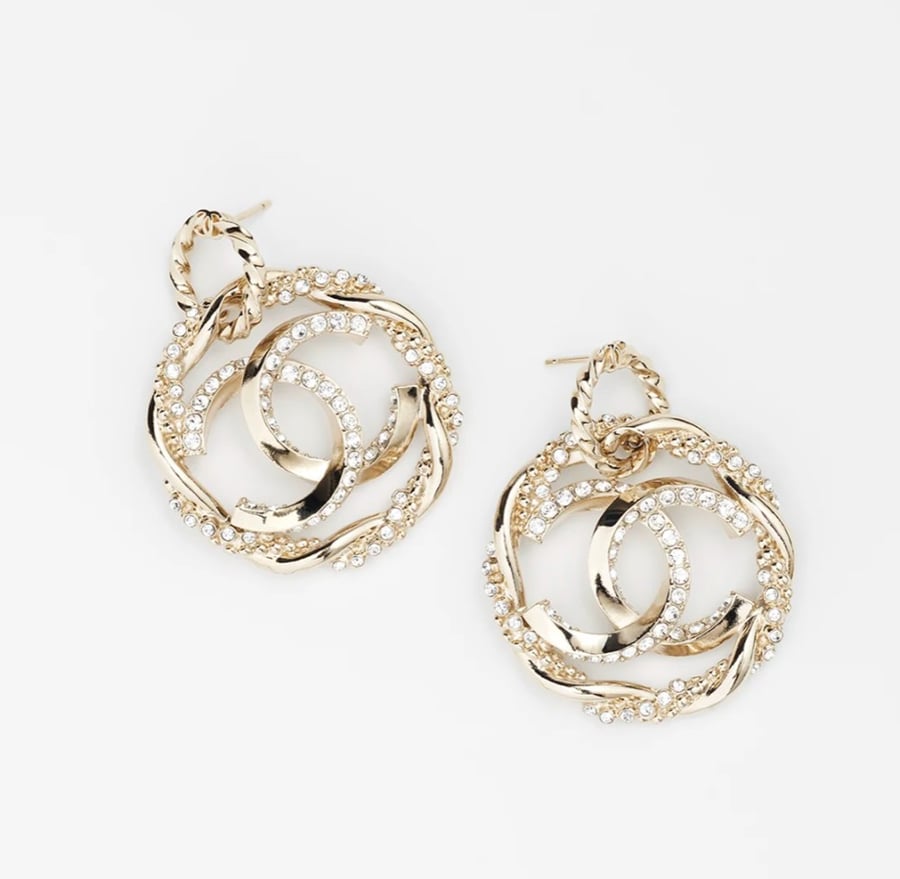 2024 Chanel pendant earrings with the CC logo inside a ring studded with hundreds of crystals