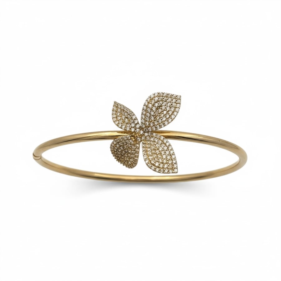 18k gold Paxal bracelet weighing 7.55 grams, set with crystal studs