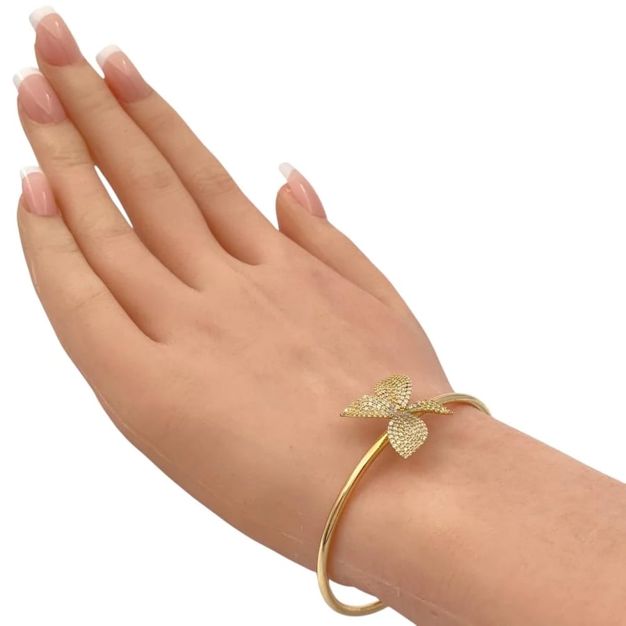 18k gold Paxal bracelet weighing 7.55 grams, set with crystal studs