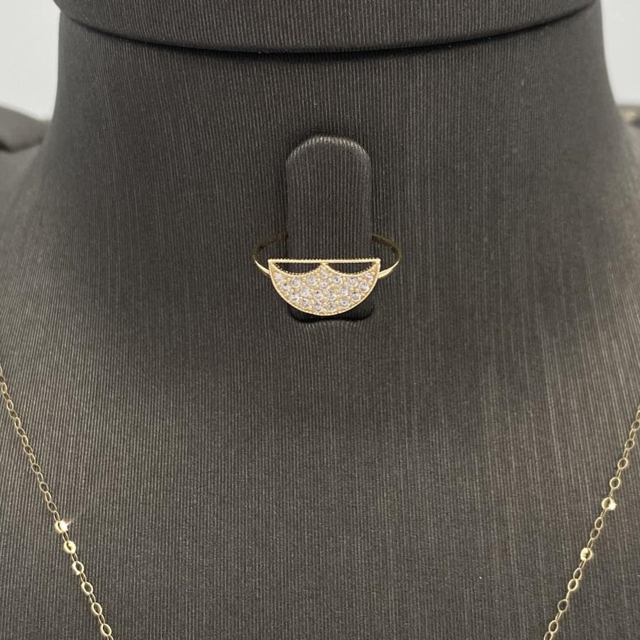 Half a set of children's gold jewelry, 18 karat, weighing 1.83 grams