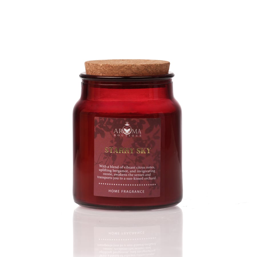 شمعة معطرة بمزيج من مكونات الحمضيات