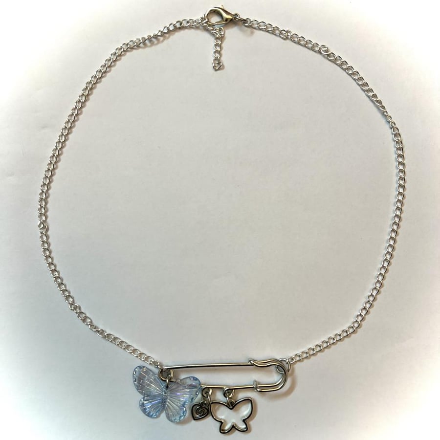 Blue butterfly pin necklace