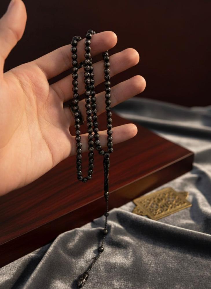 Kook rosary decorated with silver