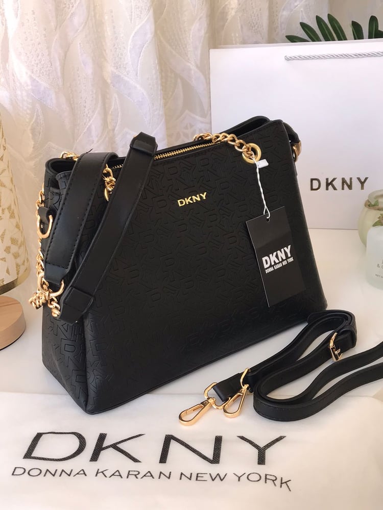 شنطة نسائية دكني DKNY - وتد