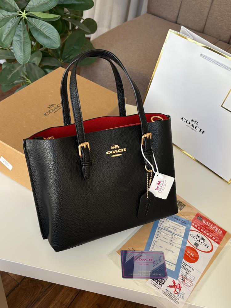 حقيبة كوتش مولي اسود