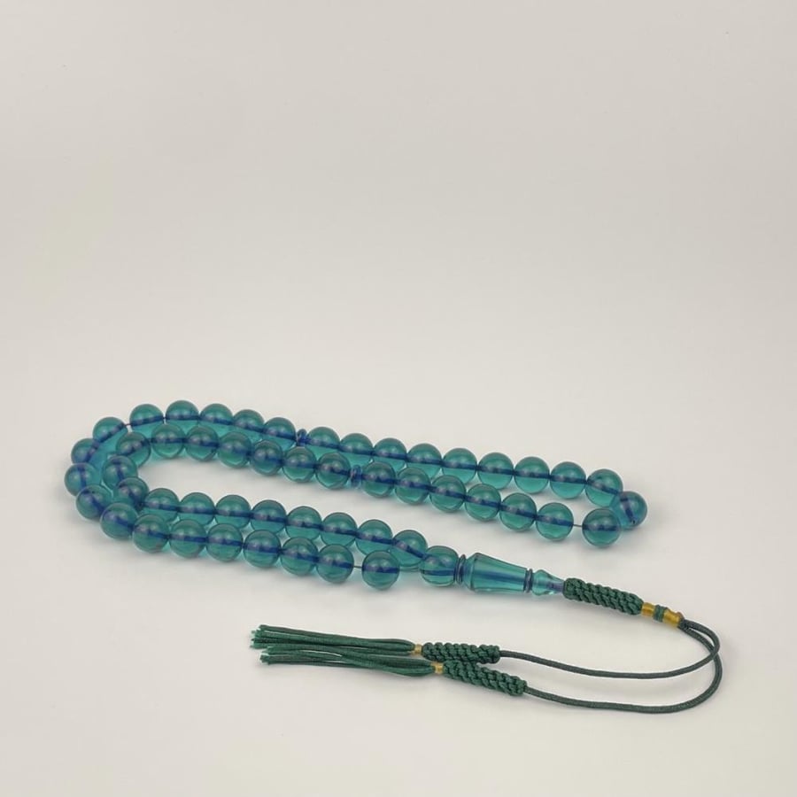 Transparent turquoise prayer beads