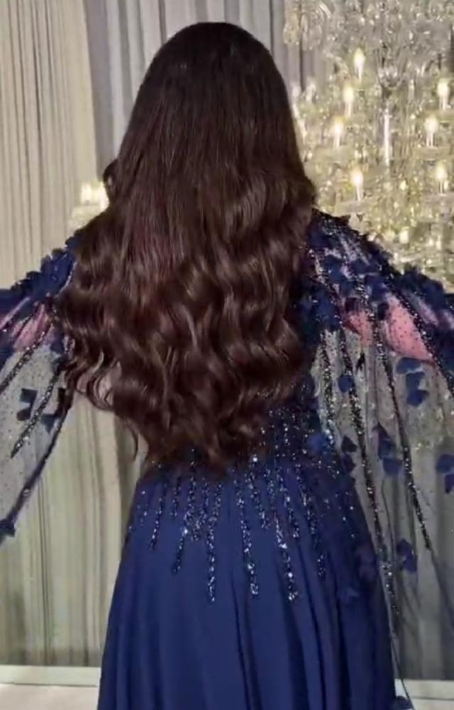 فستان سهرة كلفة مطرزة بجورجيت كلوش مع تل تصميم أنيق للمناسبات