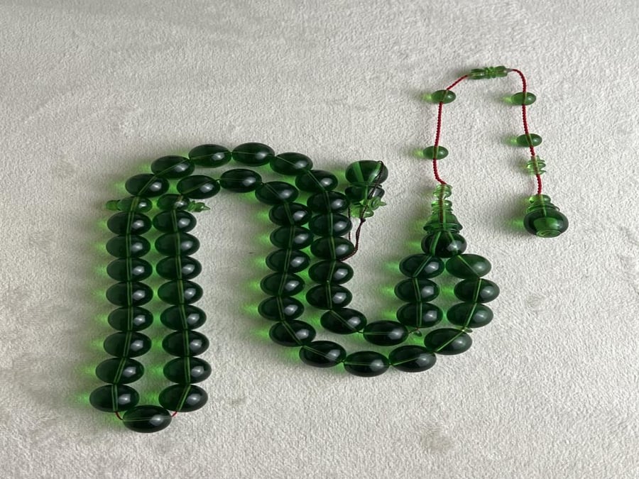 A cup with 49 beads, size 12 by 12