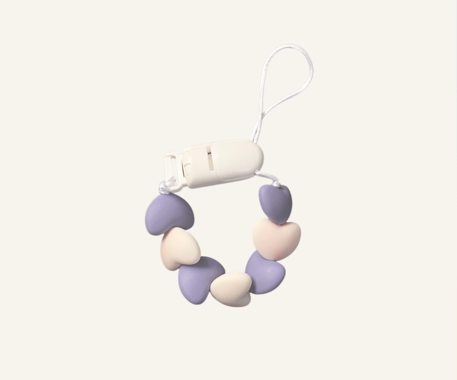 Plastic pacifier hanging ornament (purple and white hearts)