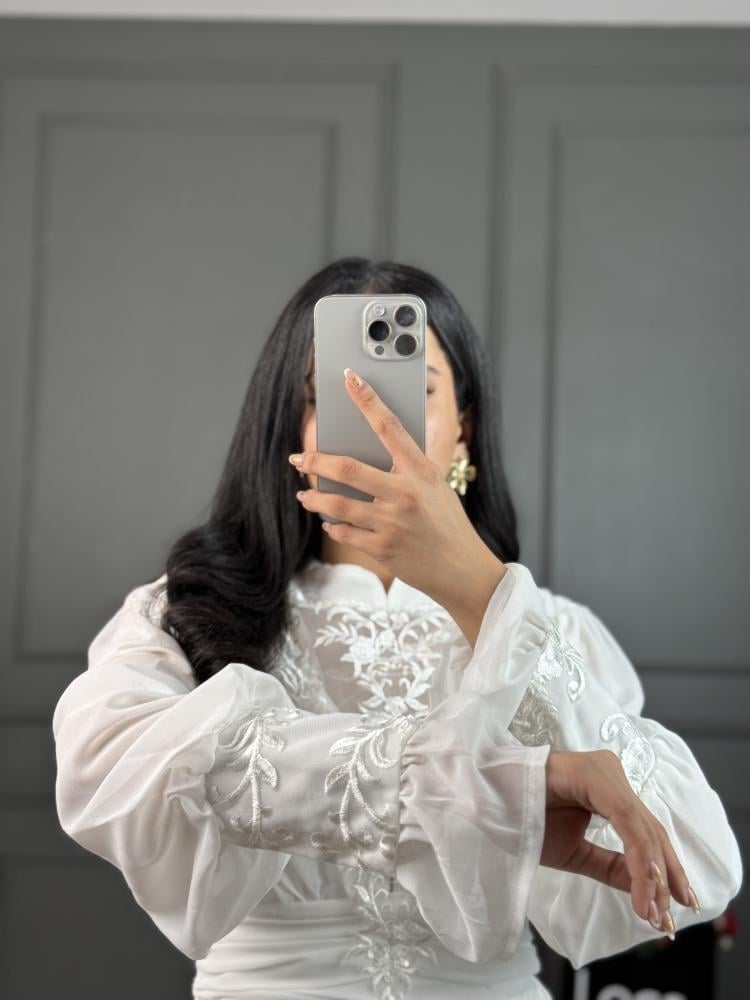 A soft fabric dress and off-white color from Luka Fashion