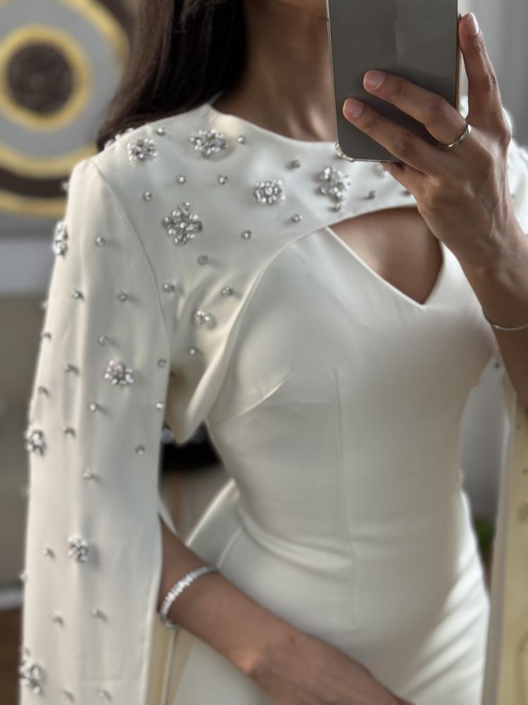 Evening dress with a soft design off white