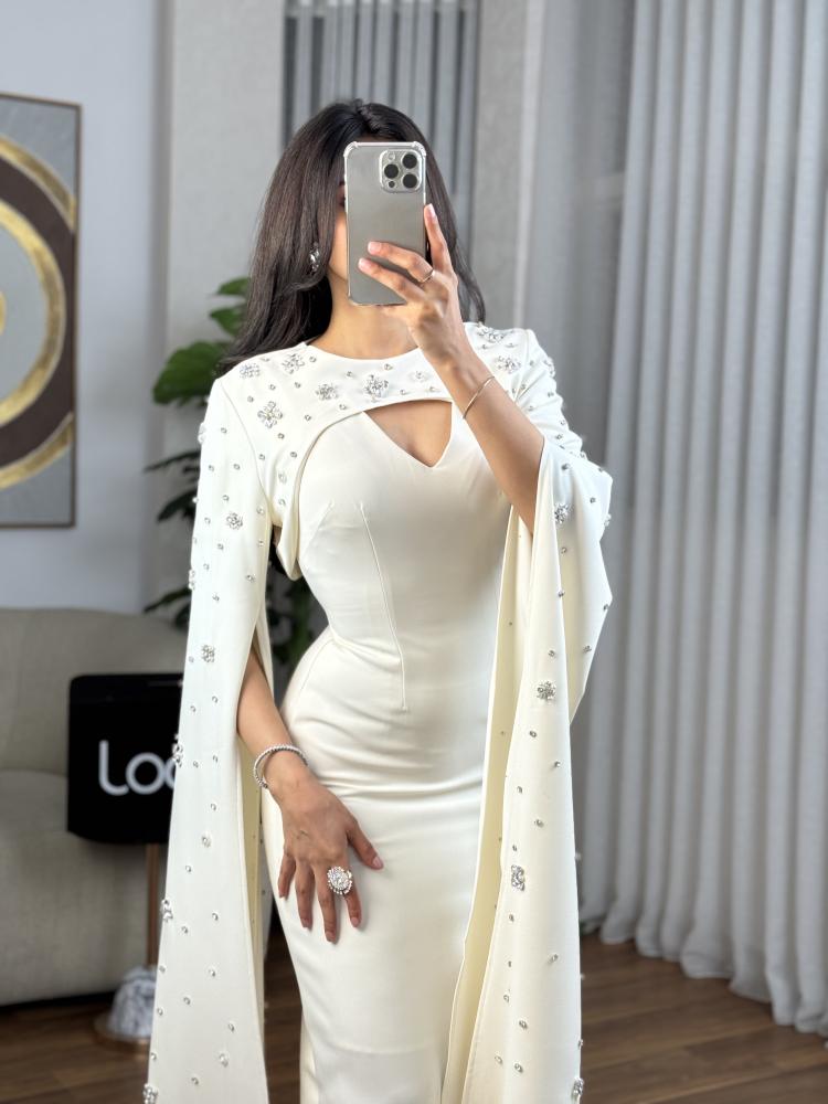 Evening dress with a soft design off white