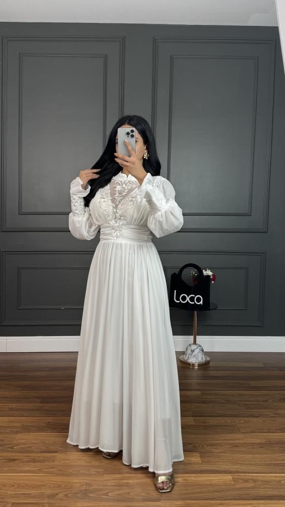 A soft fabric dress and off-white color from Luka Fashion