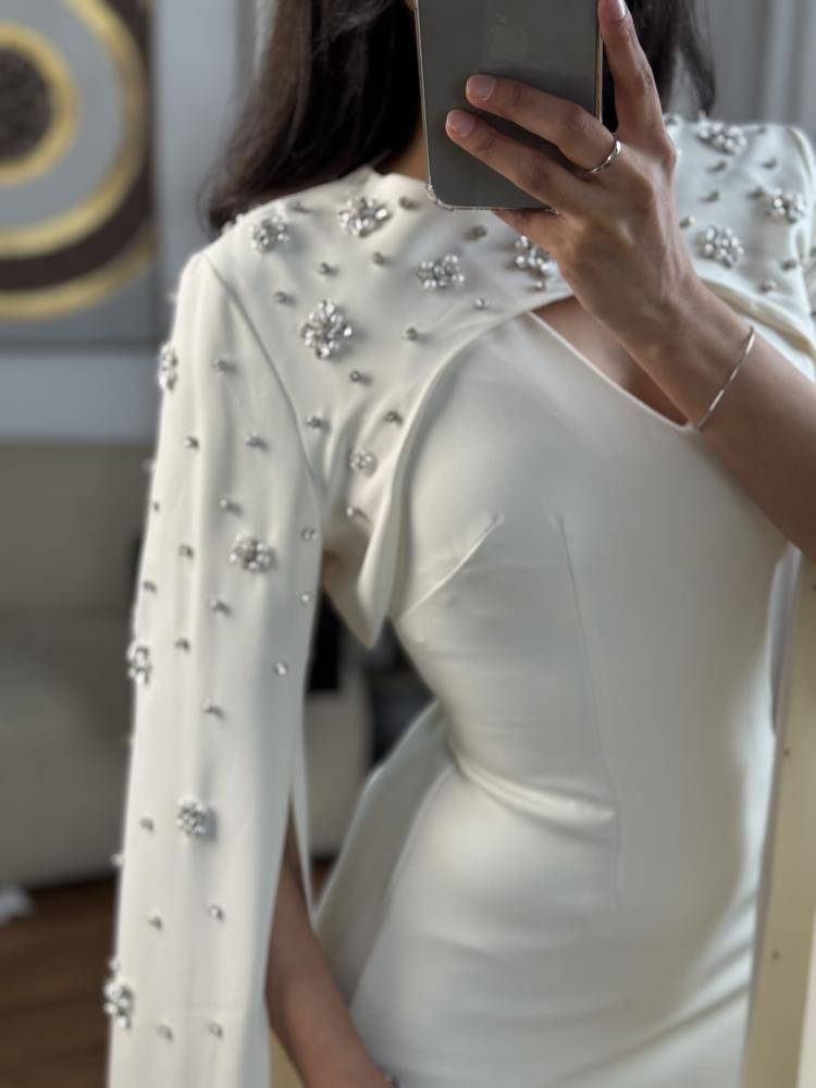 Evening dress with a soft design off white