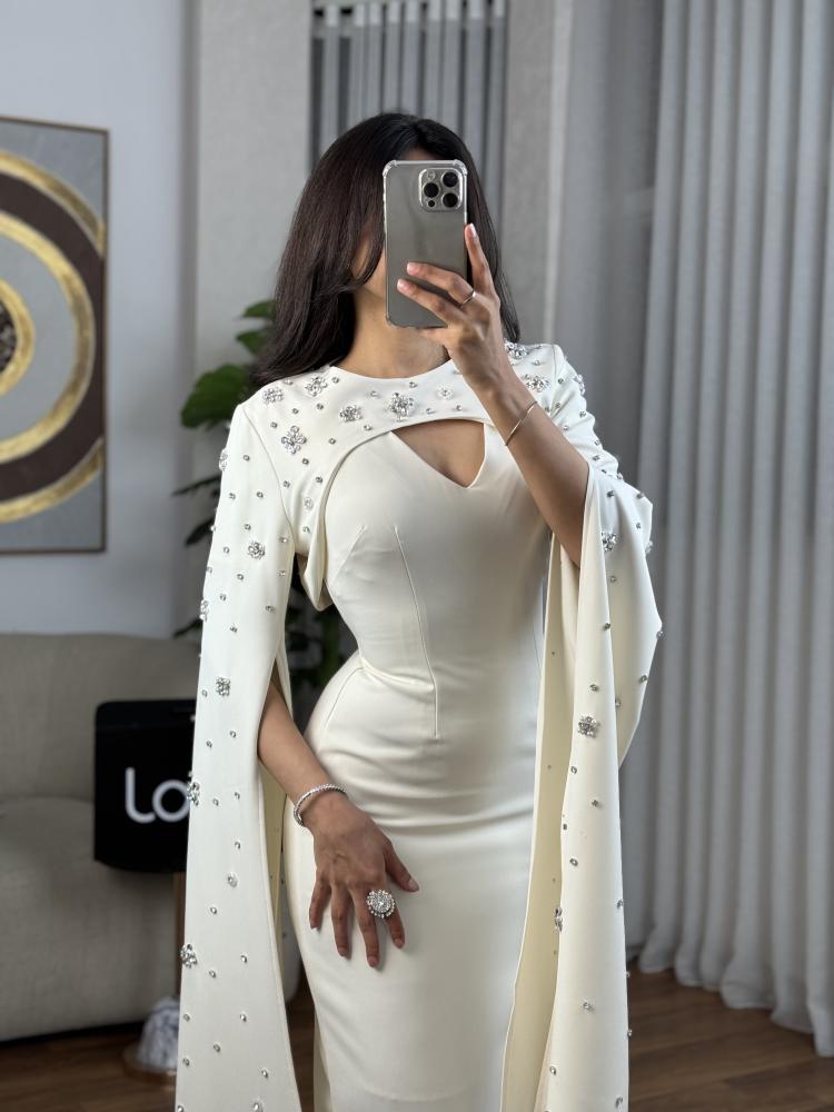 Evening dress with a soft design off white