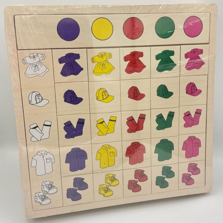 Wooden game for assembling and matching colors and shapes
