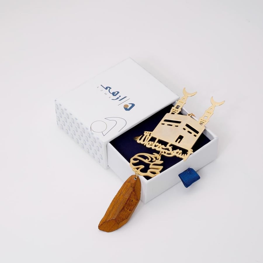 The luxurious car ornament (plated with gold water) Qibla of Muslims..