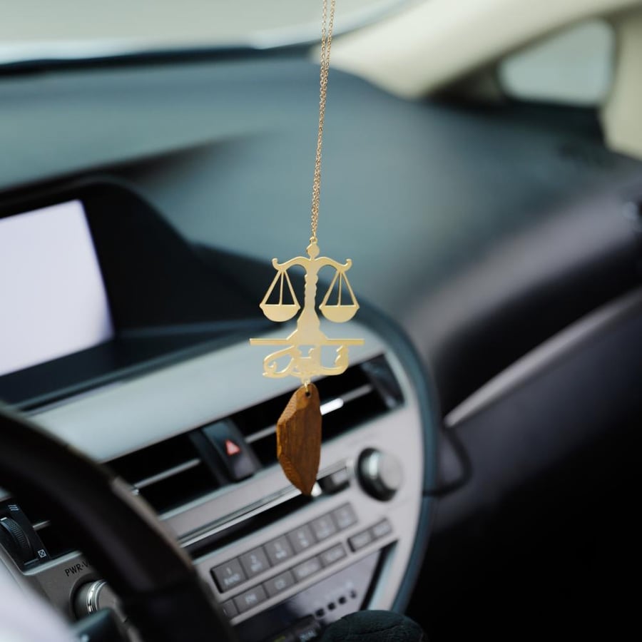 Luxury car pendant (plated with gold water) a special design for distinguished lawyers..
