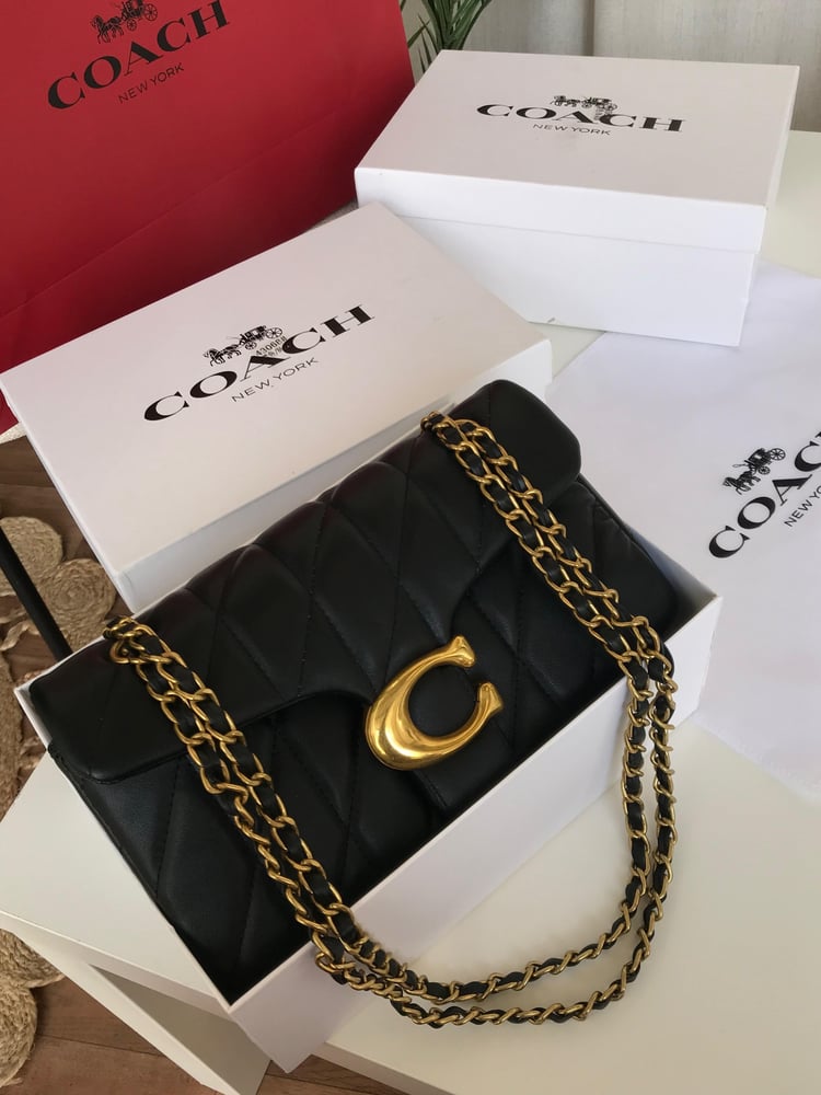 شنطة كوتش تابي