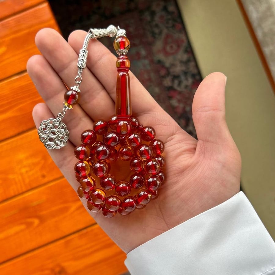 سبحة بكلايت عسلي خيط أحمر 45 خرزة - طربزونه معدن
