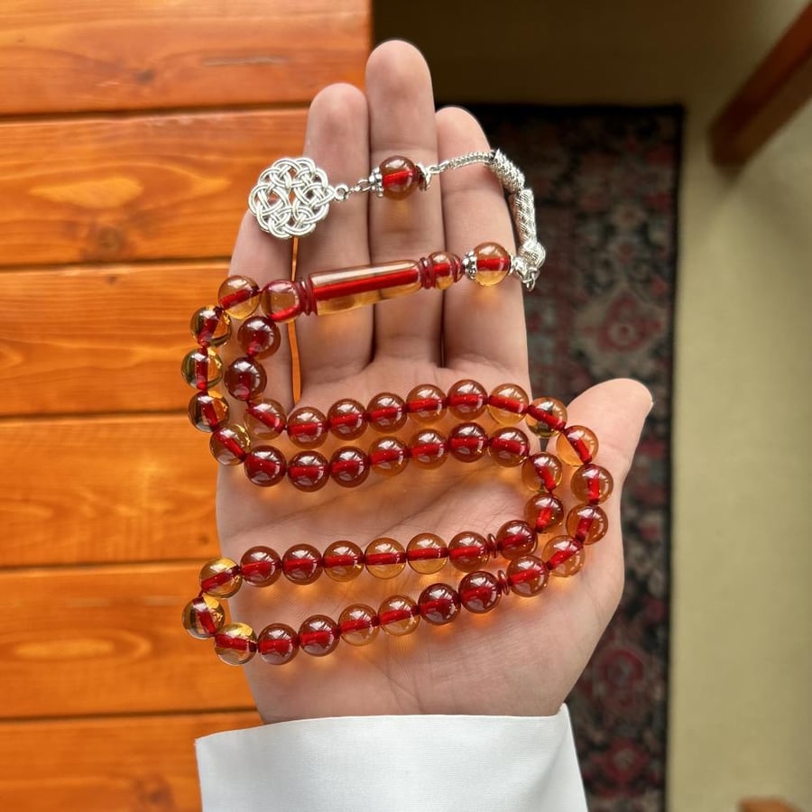 سبحة بكلايت عسلي خيط أحمر 45 خرزة - طربزونه معدن